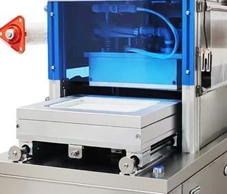 Fully Automatic Vertical Vacuum Skin Sealing Machine with Food Grade Stainless Steel and 6061 Anodized Aluminum Mold for Food Containers